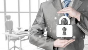 Business man holding lock